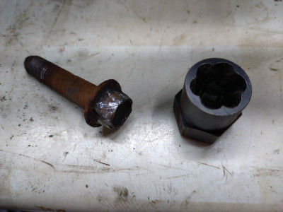 The new socket and remains of the clamp bolt