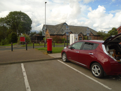 A Leaf, a free charging point, and a freshly painted pillar box.