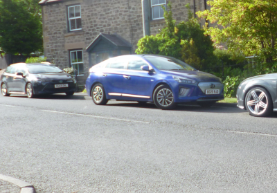 The &quot;filled in&quot; Grill tells you its the 100% Electric, the Plug-in Hybrid and Petrol Car with the misleading badge have a more honeycomb style grill.