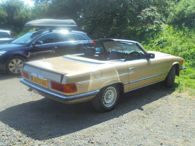 Decent colour for the weather,  well presented and top down, and enough chrome to spark a bit of interest.