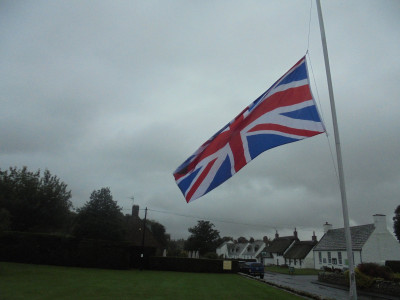 Half Mast at Etal Village<br />after a bit of unfurling from wrappage around the post by NF