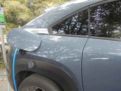Reflections in a window tinted black<br />Mazda CX30