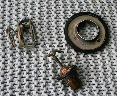 Modified original totally unstuck thermostat fitted, no sealant just the rubber seal as Nissan intended, and so far so good, no leaks.