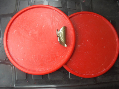 Yes a folded-over can lid<br />The worlds most effective label remover and glue scraper