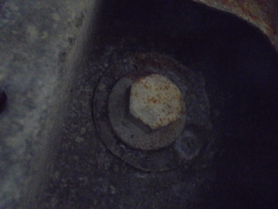 The lower radiator core support mounting bolt<br />(one each side)  No attempt at undoing,  official procedure rejected.