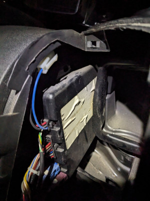 Behind drivers air vent