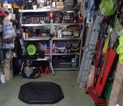 The cluttered end of the garage as it was