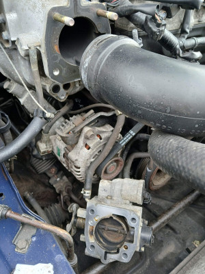 Two holes are where the EGR goes just below the intake - own work
